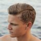 How should men alter how they shampoo their hair during hot and humid weather?